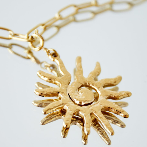 Grote Gouden chunky bedel in de vorm van een stralende zon van roestvrij staal - bevestigd aan een bedelketting