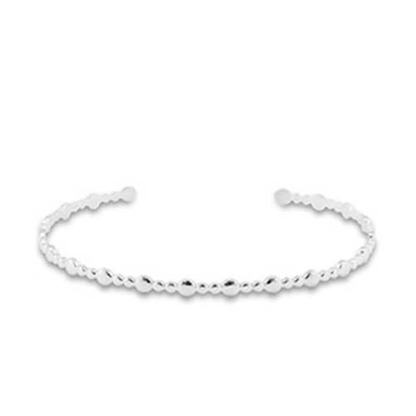 Kleine zilverkleurige RVS bangle met bolletjes in diverse grootte – subtiel reliefontwerp, ideaal voor het combineren met andere armbanden.