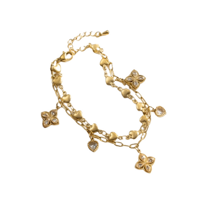 Goudkleurige dubbele armband met hartjes, schakels, zirkonia klavers en hartjes 