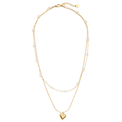 Pearly Heart Ketting met dubbele laagjes, subtiele parels en goudkleurige hartvormige hanger voor een chique en romantische uitstraling