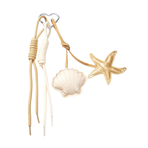 Champagne en beige bagcharm met zomerse luxe elementen - versiering voor aan je tas